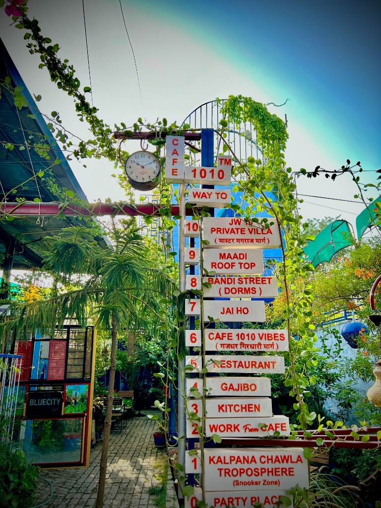 Cafe 1010 Jodhpur Signpost and Vintage Clock